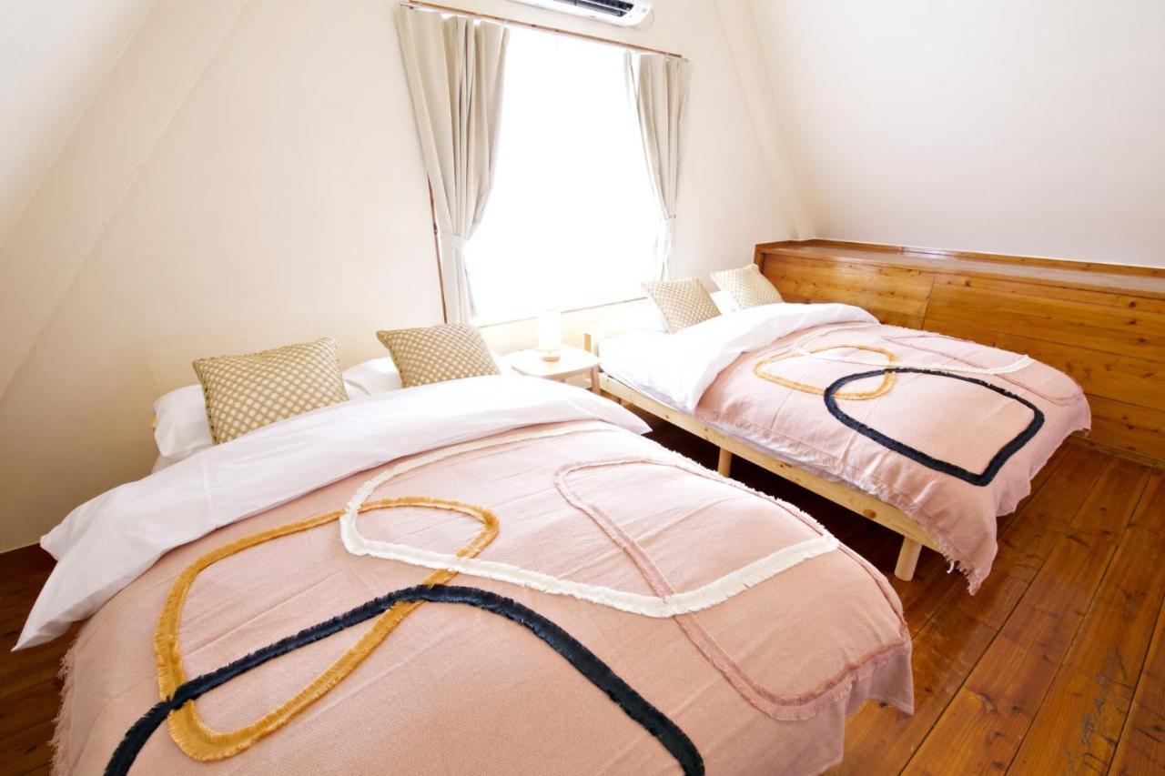 Ferienwohnung にらい恩納　あじさい Onna Exterior foto
